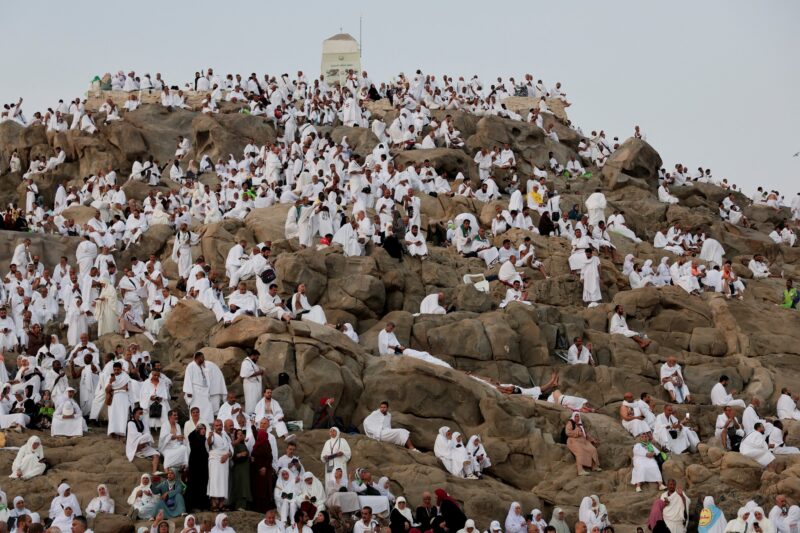Muslim pilgrims gather to pray at Jabal al-Rahmah, also known as Mount Arafat, during the annual hajj pilgrimage, outside the holy city of Mecca, Saudi Arabia, June 5, 2025. REUTERS/Khaled Abdullah